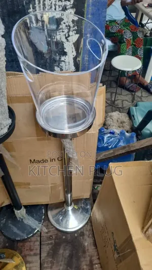 Plastic Wine or Champagne Bucket With a Stainless Steel Floor Stand.