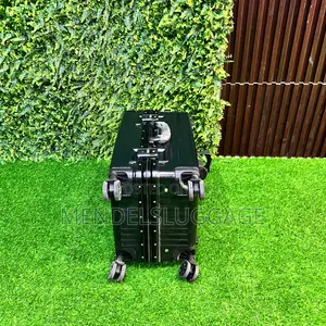 Black Hard Case Luggage With Wheel System and Bottle Holder