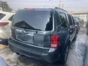 Honda Pilot Touring w/RES/Navi 4WD (3.5L 6cyl 5A) 2012 Gray