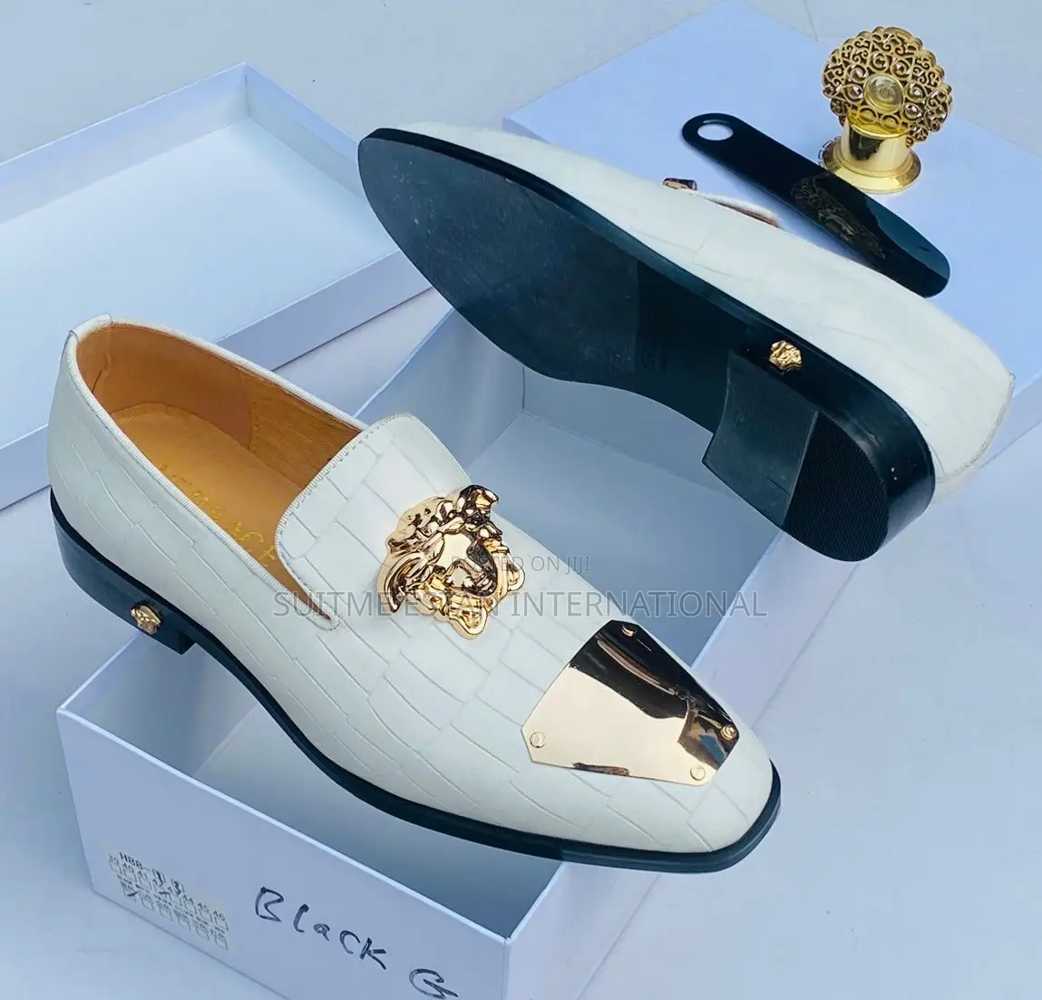 Prada and Versace Shoe