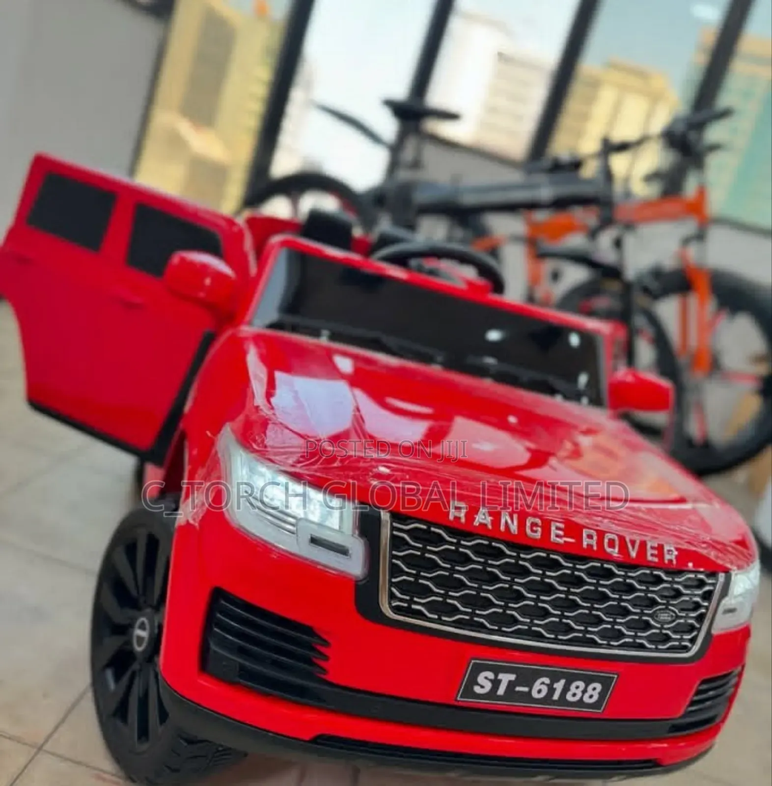 Range Rover and Tricycle
