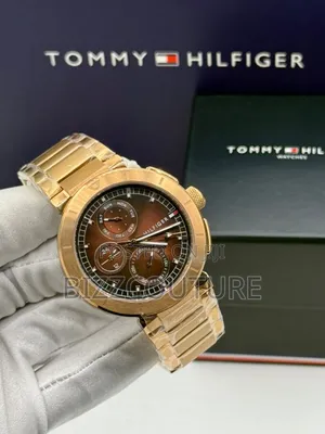 Original Tommy Hilfiger Gold Dial Chain Watch Available in Store