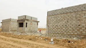 Fast Developing Estate Land in Idu With C of O Close to Train Station