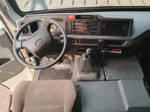 New Toyota Coaster 2025 White