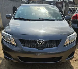 Toyota Corolla Base 4dr Sedan (1.8L 4cyl 5M) 2010 Gray