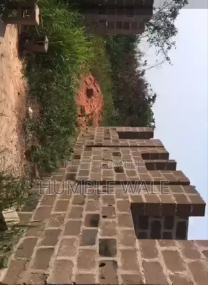 A Full Plot of Land (50 by 120) With Structures on It for Sale