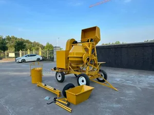 Portable Diesel-Powered Concrete Mixer With a Lift System.