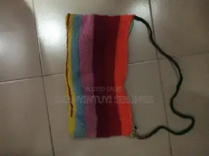 Crocheted Bag and 2 Wool/Crocheting Needle Inside