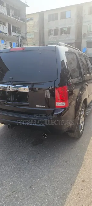 Honda Pilot Touring w/RES/Navi 4WD (3.5L 6cyl 5A) 2010 Black