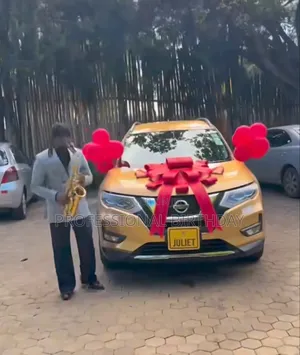 Lagos Car Bow Gift and Saxophonist