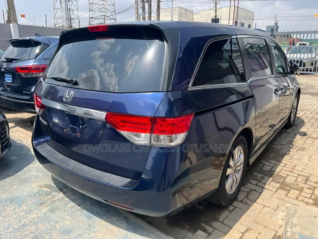2014 Honda Odyssey Touring 4dr Minivan (3.5L 6cyl 6A) - Image 1