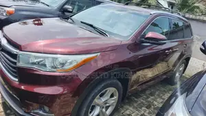 Toyota Highlander Limited Platinum 4dr SUV AWD (3.5L 6cyl 6A) 2015 Red