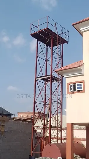 40 Ft Standing Tank Painted With Red Oxide Color