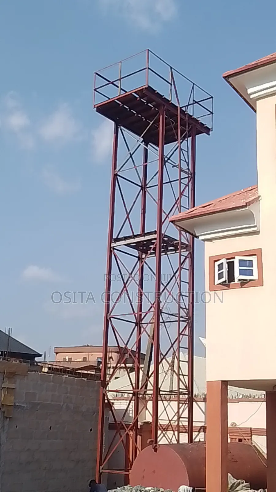 40 Ft Standing Tank Painted With Red Oxide Color