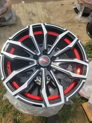 16inch With A Red Corolla,Matrix, Pontiac Vibes Rims.
