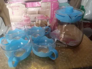 Tea Pot and 4 Glass Cups