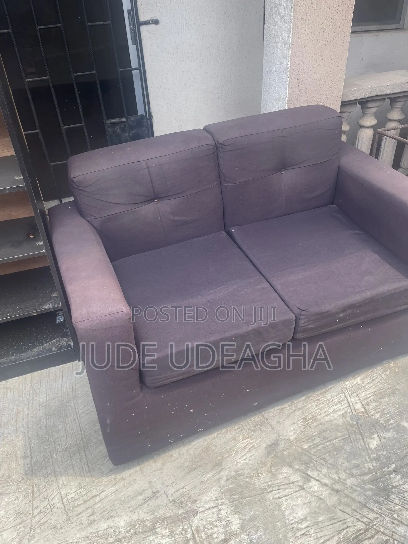 Neatly Used Grey Sofa