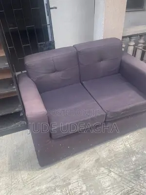 Neatly Used Grey Sofa