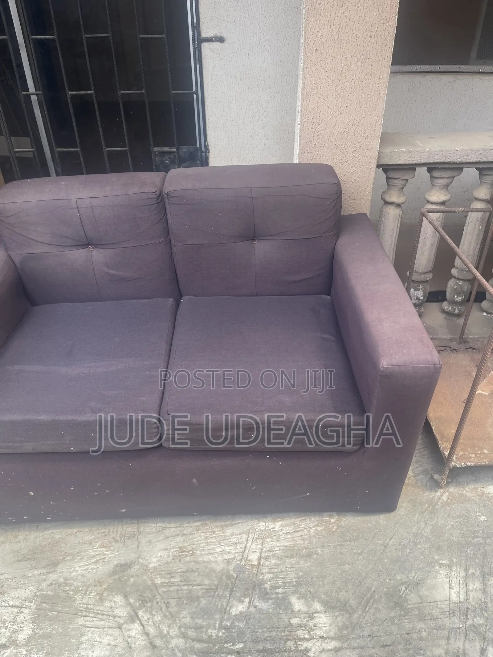 Neatly Used Grey Sofa