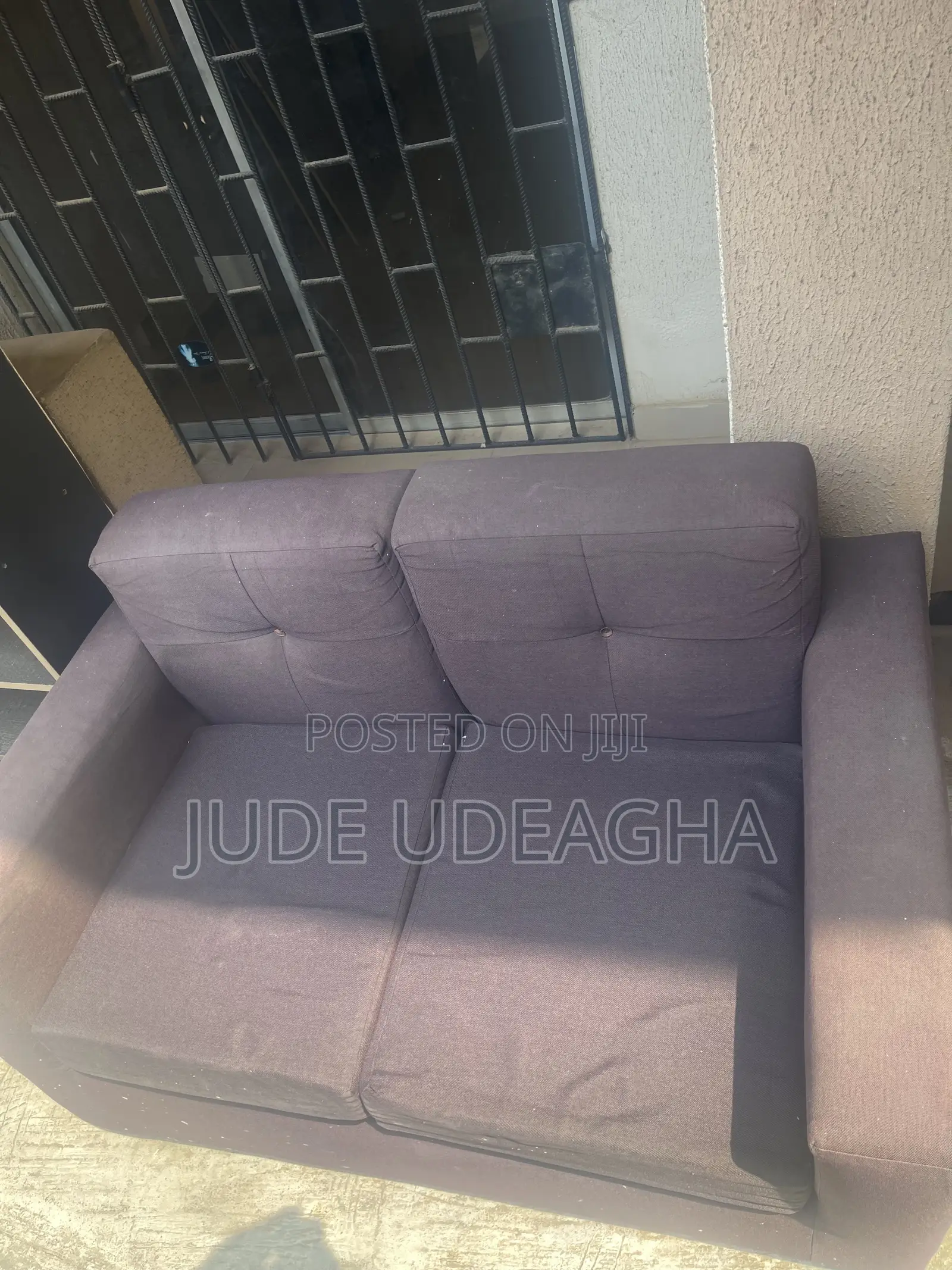 Neatly Used Grey Sofa