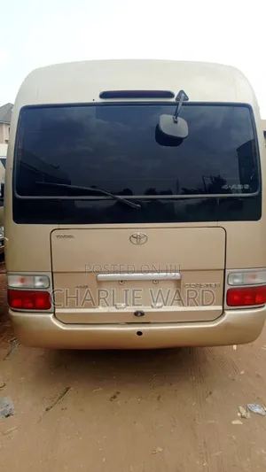Toyota Coaster 2010 Gold