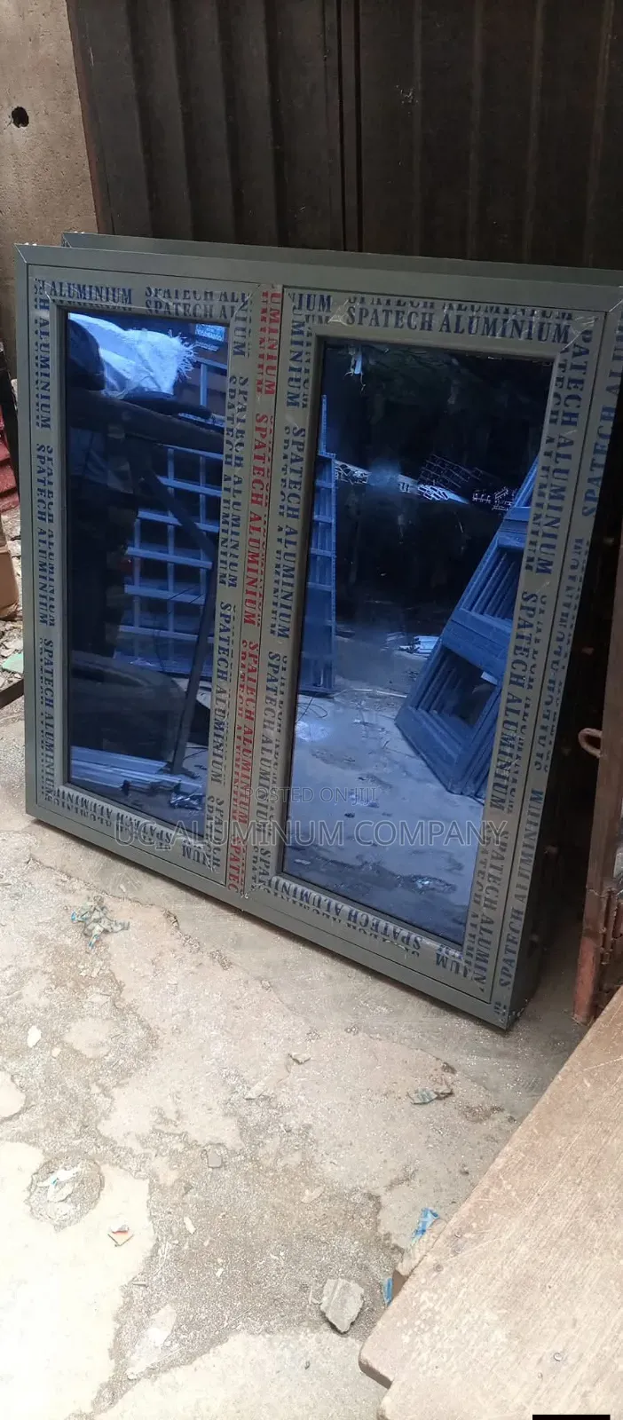 Gray Casement Windows With Burglary and Net