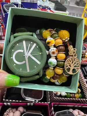 Ck Wristwatch and Bead Bangle With Box