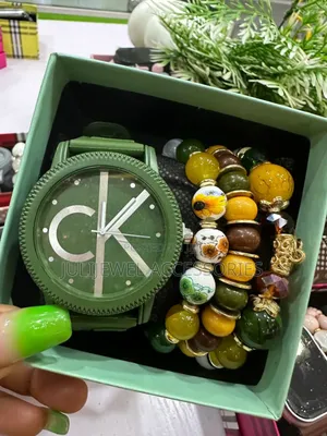 Ck Wristwatch and Bead Bangle With Box