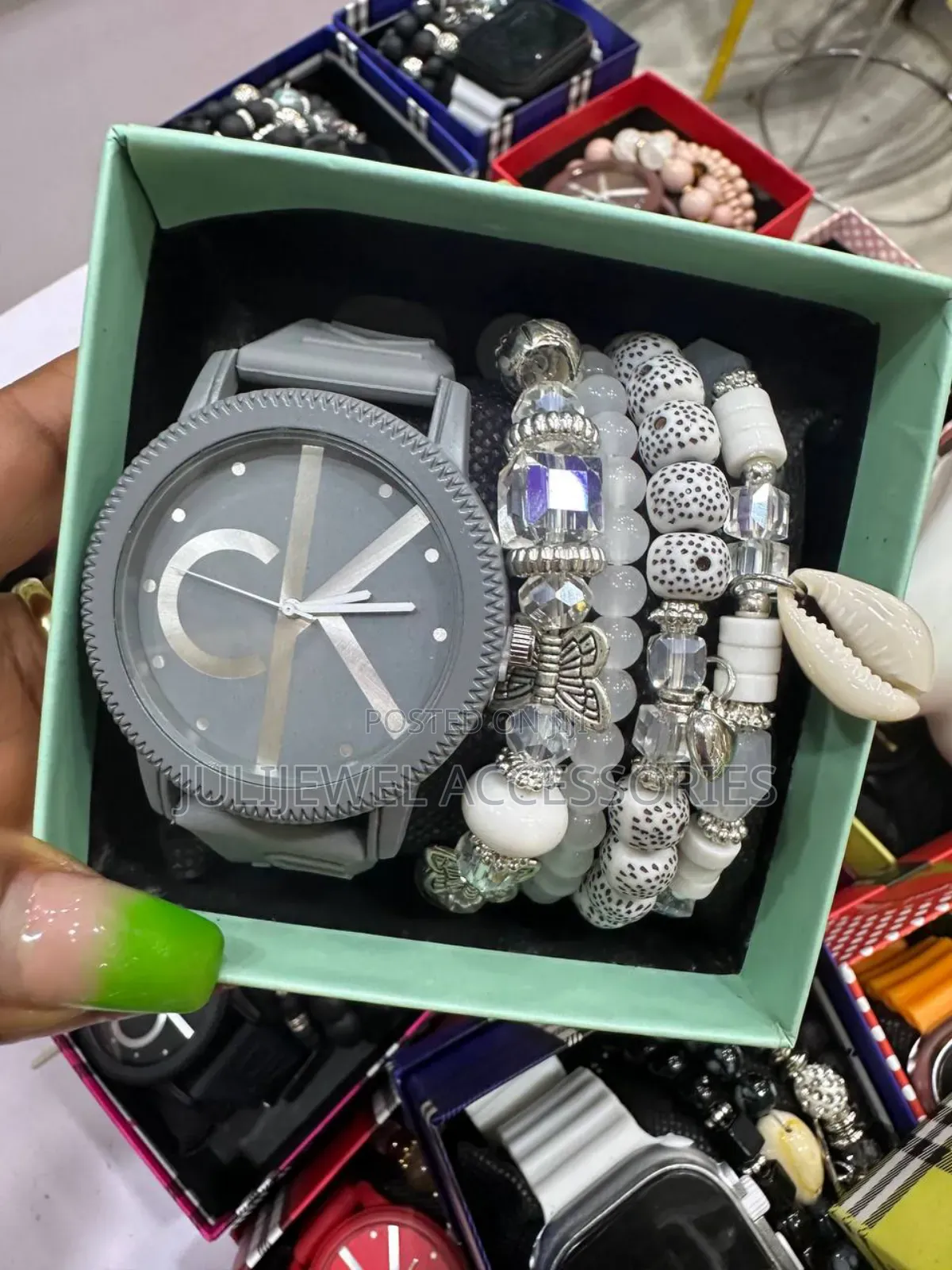 Ck Wristwatch and Bead Bangle With Box