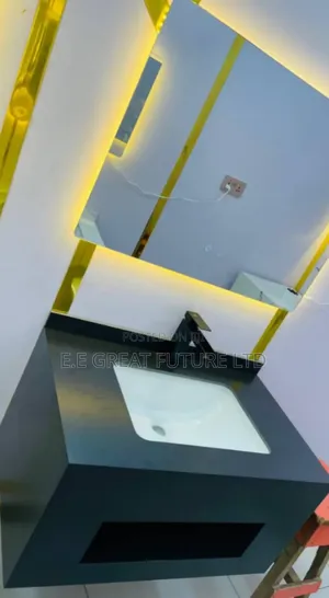 Cabinets With Wash Basin and Mirror Light