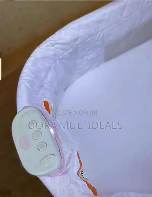Delta Children Sweet Beginners Bassinet With Music and Lights