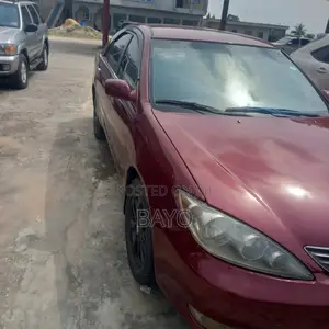 Toyota Camry LE 4dr Sedan (2.4L 4cyl 5M) 2003 Red