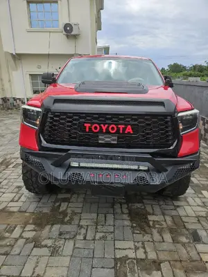 Toyota Tundra Limited 4dr Double Cab 4WD SB (5.7L 8cyl 6A) 2014 Red