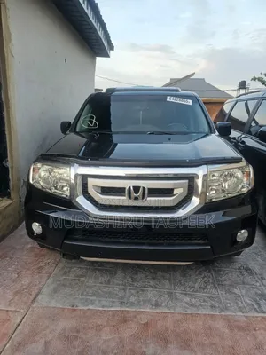 Honda Pilot Touring w/RES/Navi FWD (3.5L 6cyl 5A) 2010 Black