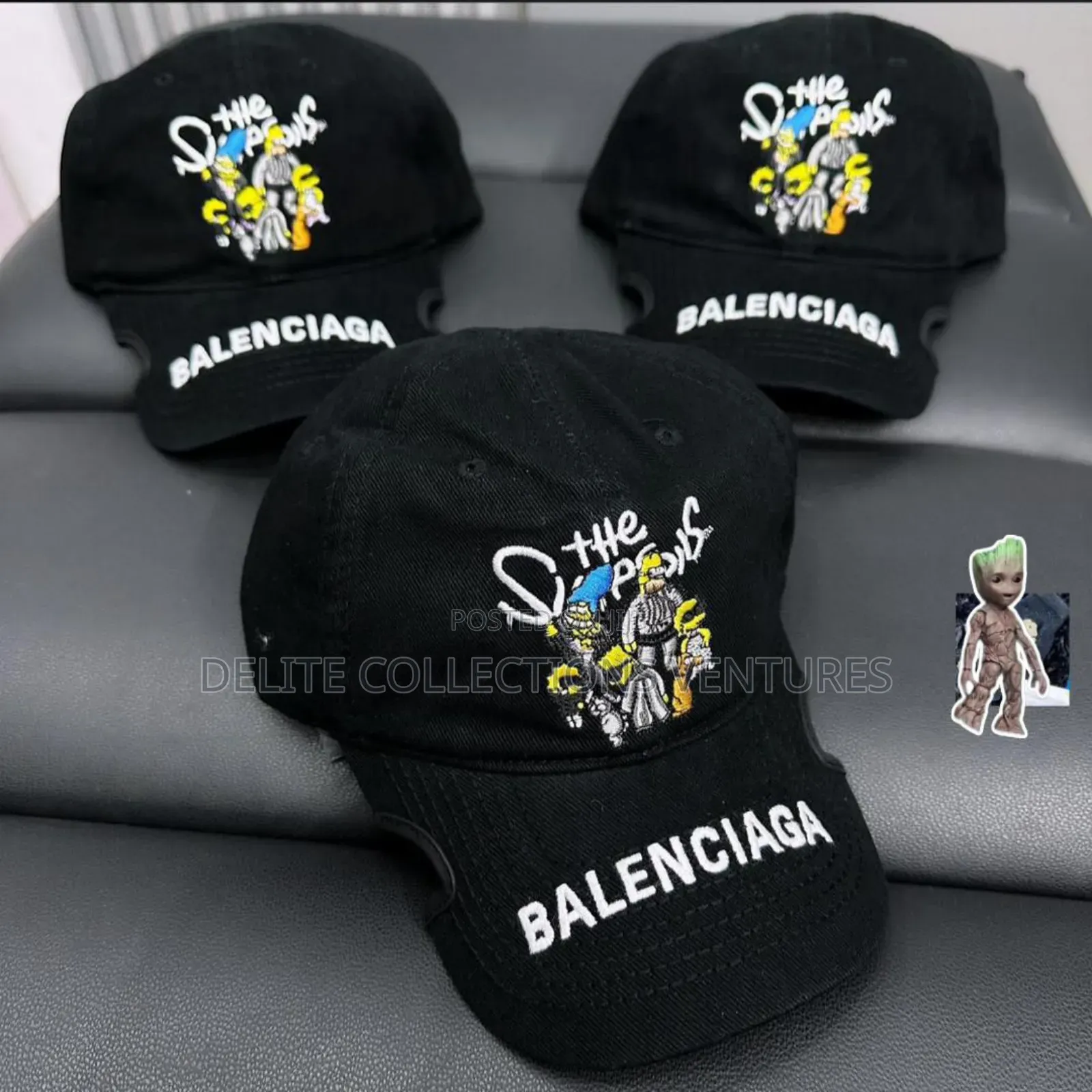 *Balenciaga the Simpsons Cap and *Supreme Stone Camo Cap* 