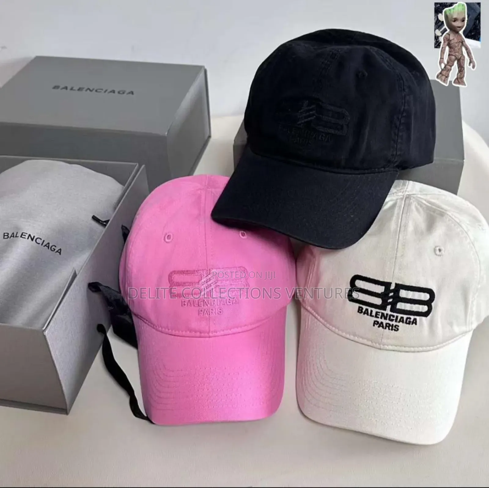*Balenciaga the Simpsons Cap and *Supreme Stone Camo Cap* 