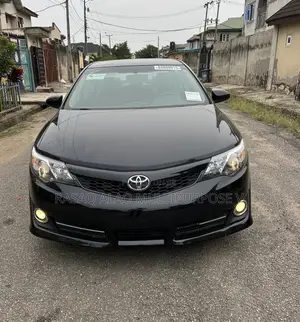 Toyota Camry SE Sport 4dr Sedan w/Prod. End 11/13 (2.5L 4cyl 6A) 2014