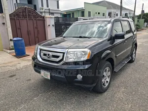 Honda Pilot Touring w/RES/Navi 4WD (3.5L 6cyl 5A) 2010 Black