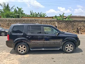 Honda Pilot Touring w/RES/Navi 4WD (3.5L 6cyl 5A) 2010 Black