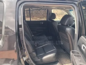 Honda Pilot Touring w/RES/Navi 4WD (3.5L 6cyl 5A) 2010 Black