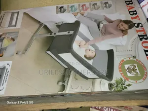 Baby Stroller Next to Mom Bed