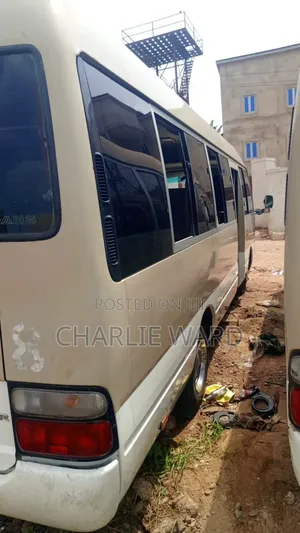 Toyota Coaster 2010 Gold