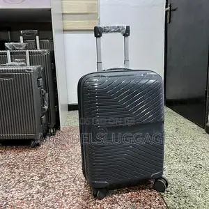 Dark Gray Hard-Shell Spinner Suitcase With Modern Design