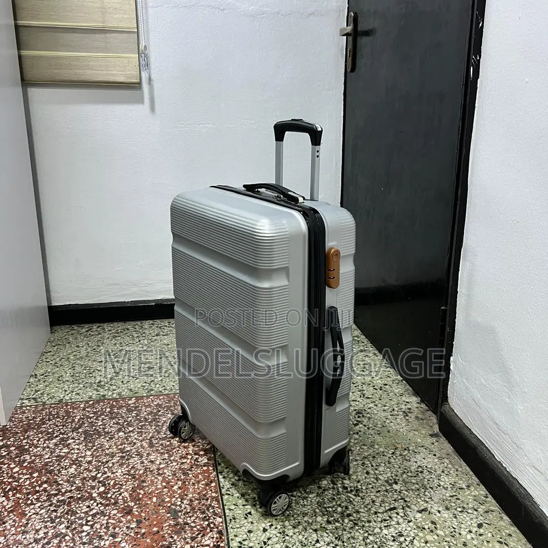 Medium Silver Spinner Suitcase With Hard-Shell Body