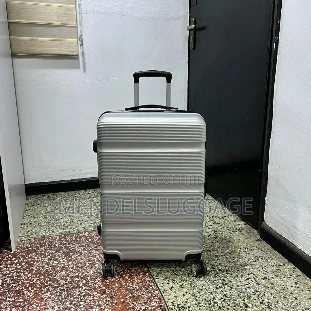 Medium Silver Spinner Suitcase With Hard-Shell Body