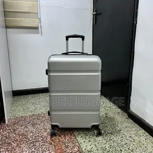 Medium Silver Spinner Suitcase With Hard-Shell Body