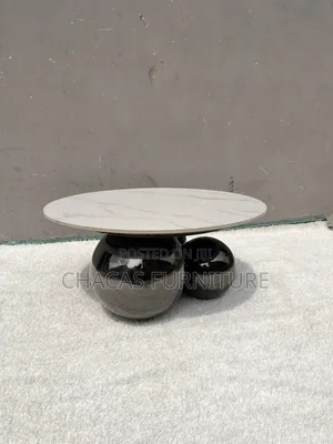 Luxury Marble-Top Coffee Table With Chrome Spherical Base