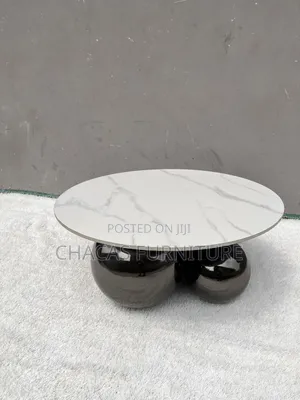Luxury Marble-Top Coffee Table With Chrome Spherical Base