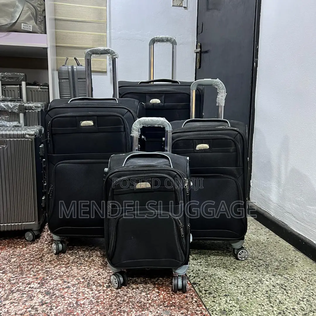Black Soft-Shell Spinner Suitcase Set (4 Pieces)