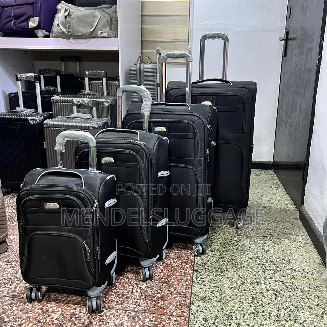 Black Soft-Shell Spinner Suitcase Set (4 Pieces)